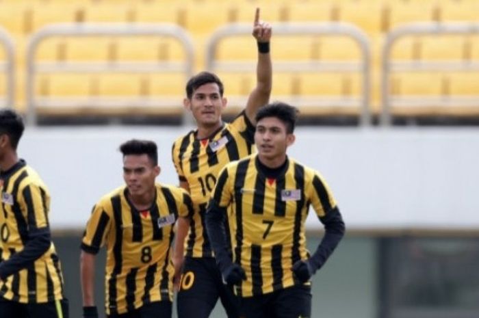 Selebrasi pemain timnas U-19 Malaysia seusai membobol gawang timnas U-19 Indonesia pada laga Grup F Kualifikasi Piala Asia U-19 2018 di Stadion Paju, Korea Selatan, Senin (6/11/2017) pagi WIB. 