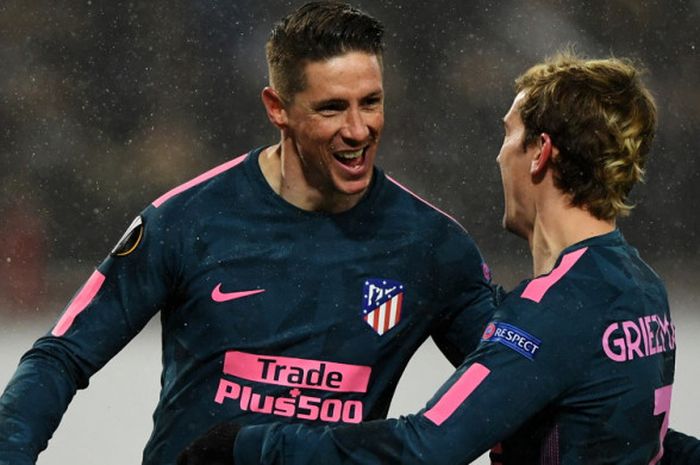  Selebrasi striker Atletico Madrid, Fernando Torres (kiri), bersama Antoine Griezmann setelah mencetak gol ke gawang Lokomotiv Moskva dalam laga leg 2 babak 16 besar Liga Europa di Stadion RZD Arena, Moskow, Rusia, pada Kamis (15/3/2018). 