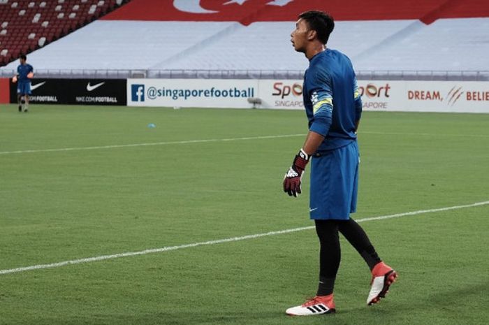  Kiper timnas U-23 Indonesia, Awan Setho saat melawan timnas U-23 Singapura di Stadion Nasional, Singapura, Rabu (21/3/2018).  