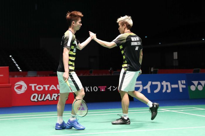 Marcus Fernaldi Gideon/Kevin Sanjaya Sukamuljo saat berhadapan dengan Vladimir Ivanov/Ivan Sozonoz pada babak pertama Japan Open 2018, Rabu (12/9/2018).