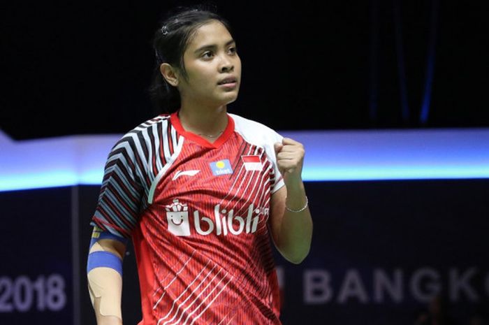 Ekspresi pebulu tangkis tunggal putri Indonesia, Gregoria Mariska Tunjung, saat meraih poin atas sang lawan, Gao Fangjie, pada laga penyisihan Grup D Piala Uber 2018 di Impact Arena, Bangkok, Thailand, Rabu (23/5/2018).