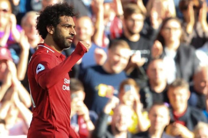 Mohamed Salah merayakan golnya untuk Liverpool FC ke gawang Brighton and Hove Albion dalam partai Liga Inggris di Anfield, Liverpool, 25 Agustus 2018.