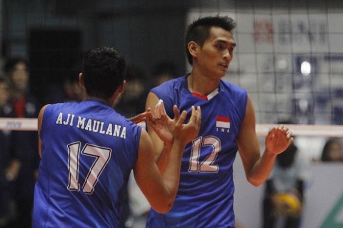 Pebola voli putra nasional, Rivan Nurmulki, bereaksi pada laga perebutan posisi ketiga Kejuaraan Bola Voli Asia (Asian Men's Championship) 2017 di GOR Tridharma, Gresik, Selasa (1/8/2017).