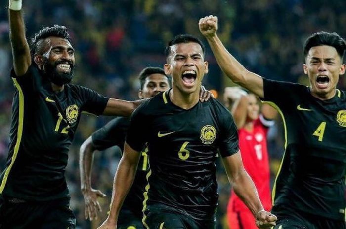 Para pemain Malaysia saat merayakan gol