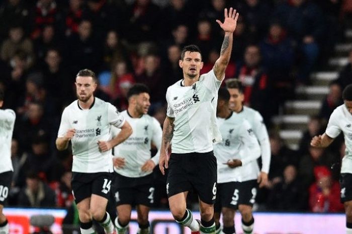 Bek Liverpool FC, Dejan Lovren, setelah mencetak gol ke gawang Bournemouth dalam laga lanjutan Liga Inggris antara kedua tim di Stadion Vitality, Minggu (17/12/2017),