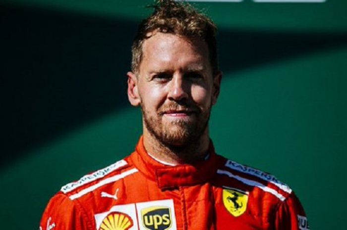 Sebastian Vettel (Ferrari) saat berada di podium usai balapan F1 GP Hongaria 2018 berakhir