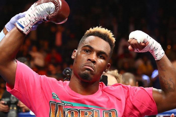 Pose kemenangan  Jermell Charlo (Amerika Serikat) setelah berhasil mempertahankan gelar juara WBC miliknya dalam laga kontra Austin Trout (Amerika Serikat) pada Sabtu (9/6/2018) waktu setempat