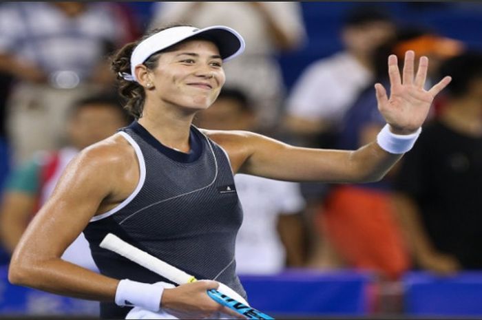 Garbine Muguruza berhasil melajju ke babak 16 besar Wuhan Open 2017 setelah mengalahkan Lesia Tsurenko, Selasa (26/9/2017).