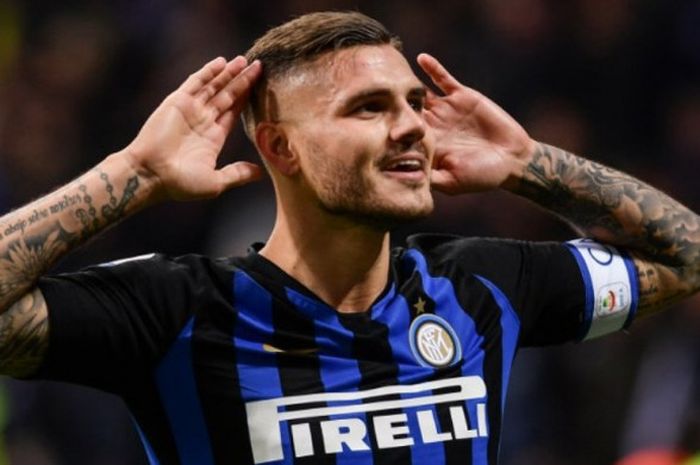 Penyerang Inter Milan, Mauro Icardi, merayakan golnya ke gawang AC Milan dalam partai Liga Italia di Giuseppe Meazza, 21 Oktober 2018.