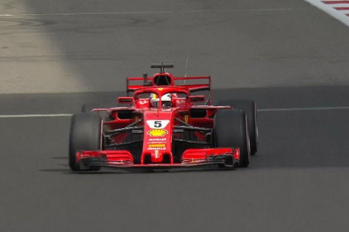 Pebalap Ferrari Sebastian Vettel menjadi yang tercepat saat sesi latihan bebas pertama GP Rusia di Sirkuit Sochi, Rusia, Jumat (28/9/2018).