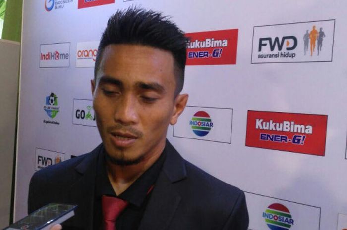 Gelandang Bali United, Muhammad Taufiq, dalam acara launching Liga 1 2018, Senin (19/3/2018). 