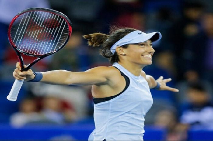 Petenis wanita asal Prancis, Caroline Garcia, saat berselebrasi di ajang Wuhan Open 2017.