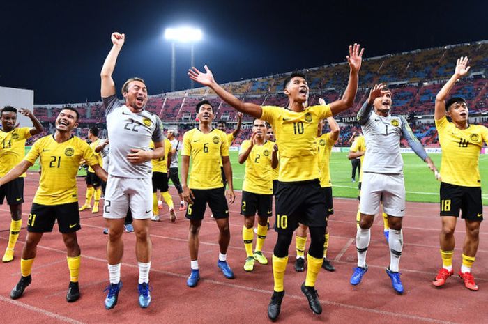 Pemain timnas Malaysia merayakan kelolosan ke babak final Piala AFF 2018, Rabu (5/12/2018).