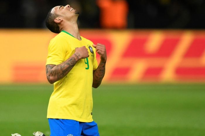 Penyerang Brasil, Gabriel Jesus, melakukan selebrasi setelah mencetak gol ke gawang Jerman pada laga persahabatan di Olympiastadion, Berlin, Selasa (27/3/2018) waktu setempat atau Rabu dini hari WIB.