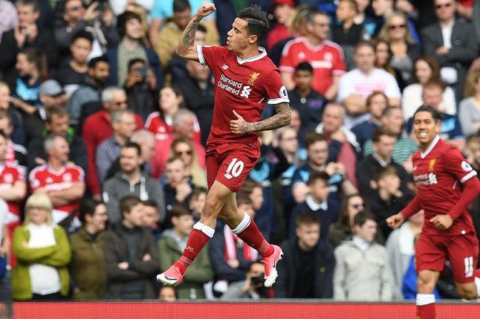 Pemain Liverpool, Philippe Coutinho, beraksi pada partai Liga Inggris kontra Middlesbrough di Stadion Anfield, Liverpool, pada 21 Mei 2017.