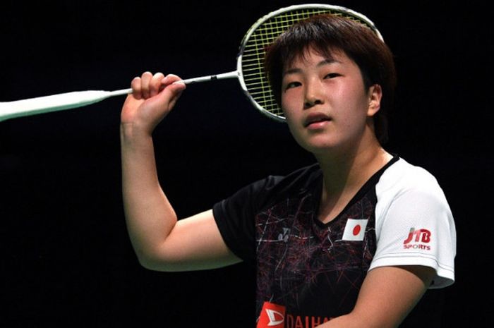 Pebulu tangkis tunggal putri Jepang, Akane Yamaguchi, bereaksi saat menjalani laga final Australia Terbuka degan menghadapi rekan senegaranya, Nozomi Okuhara, di Sydney, Mingu (25/6/2017).