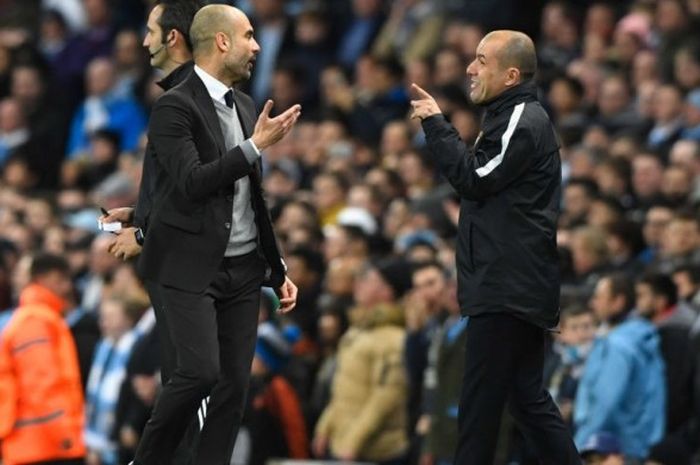 Pelatih AS Monaco, Leonardo Jardim (kanan), beradu mulut dengan Manajer Manchester City, Josep Guardiola, dalam pertandingan leg 1 babak 16 besar Liga Champions di Stadion Etihad, Manchester, Inggris, pada Selasa (21/2/2017).