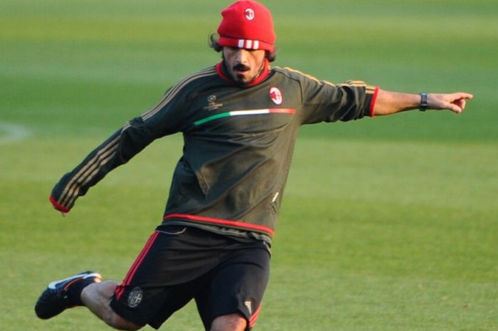 Gennaro Gattuso saat menjalani latihan tim AC Milan di Milanello, 22 November 2011.