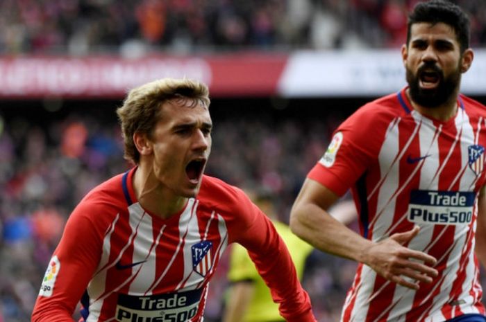 Antoine Griezmann (kiri) merayakan gol dia ke gawang Celta Vigo dalam partai Liga Spanyol di Wanda Metropolitano, Madrid, 11 Maret 2018.