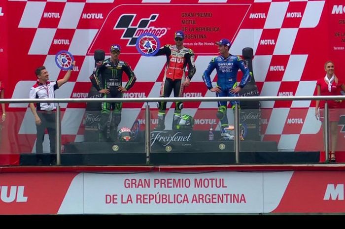 Johann Zarco, Cal Crutchlow, dan Alex Rins, saat merayakan podium GP Argentina 2018.