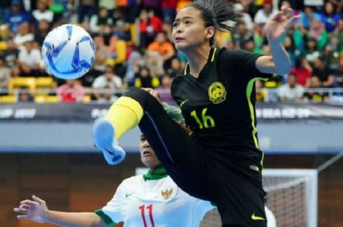 Timnas Futsal Putri Indonesia berduel dengan pemain Malaysia, Minggu (20/8/2017)