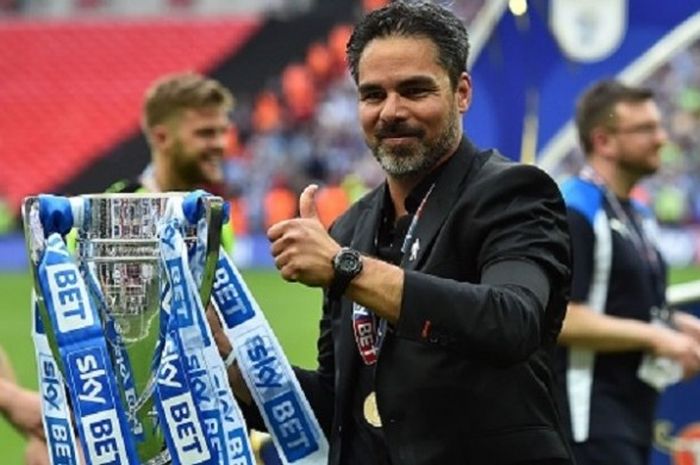 David Wagner merayakan keberhasilan Huddersfield Town lolos ke Premier League setelah menang atas Reading pada play-off di Stadion Wembley, Senin (29/5/2017). 