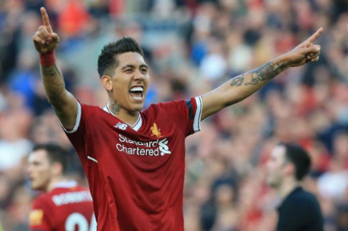  Ekspresi penyerang Liverpool, Roberto Firmino, usai mencetak gol ke gawang AFC Bournemouth pada pertandingan Liga Inggris di Stadion Anfield, Sabtu (14/4/2018). 