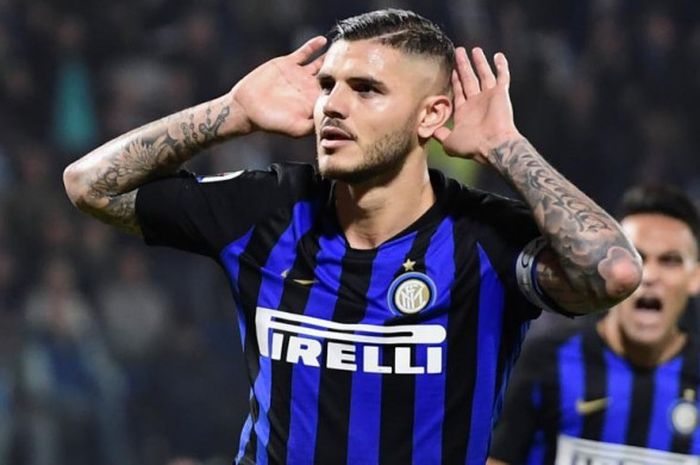 Bomber Inter Milan, Mauro Icardi, melakukan selebrasi setelah mencetak gol ke gawang SPAL pada laga lanjutan Liga Italia di Stadion Paolo Mazza, Minggu (7/10/2018) waktu setempat.