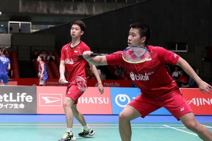 Pasangan ganda putra Indonesia, Marcus Fernaldi Gideon/Kevin Sanjaya Sukamuljo, saat menjalani laga babak kedua turnamen Jepang Terbuka di Tokyo Metropolitan Gymnasium, Kamis (21/9/2017).