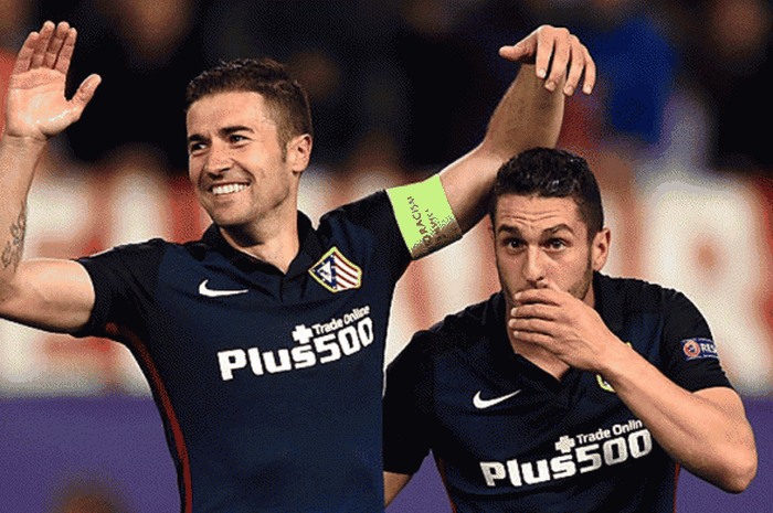 Gabi dan Koke saat melakukan selebrasi dalam laga perempat final UEFA Champions League antara Atletico Madrid kontra Barcelona di Vicente Calderon, 13 April 2016 
