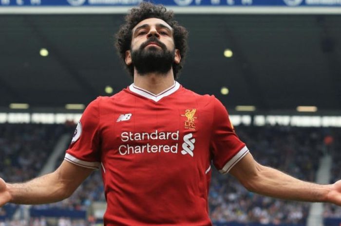 Penyerang sayap Liverpool, Mohamed Salah, merayakan golnya ke gawang West Bromwich Albion dalam partai Liga Inggris di Stadion The Hawthorns, West Bromwich pada 21 April 2018. 