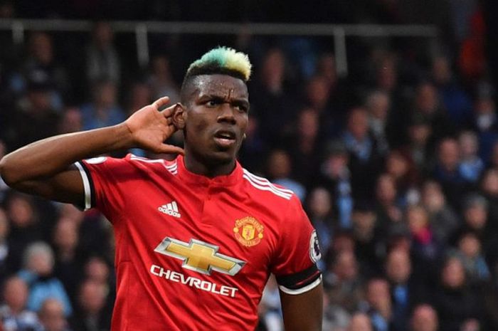 Gelandang Manchester United, Paul Pogba, merayakan gol ke gawang Man City di ajang Liga Inggris di Stadion Etihad, Manchester, Sabtu (7/4/2018).