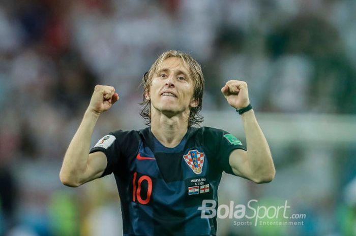 Ekspresi gelandang dan kapten Kroasia, Luka Modric,, setelah timnya lolos ke final Piala Dunia 2018 dan mengalahkan Inggris di Stadion Luzhniki, Kamis (12/7/2018). 