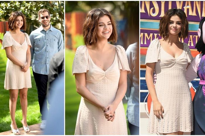 Selena Gomez kenakan mini dress merek Miu Miu yang feminin dan bergaya vintage. Cantik banget! 