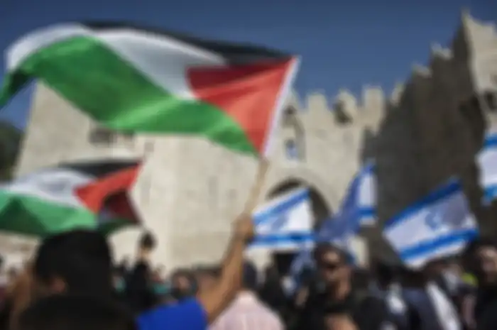 Ribuan nasionalis melambaikan bendera Israel, berbaris di kawasan Muslim Kota Tua untuk menandai acara yang dikenal dengan nama hari Yerussalem.