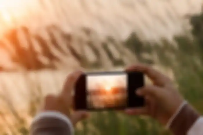 Gunakan tips fotografi untuk memotret dengan smartphone.