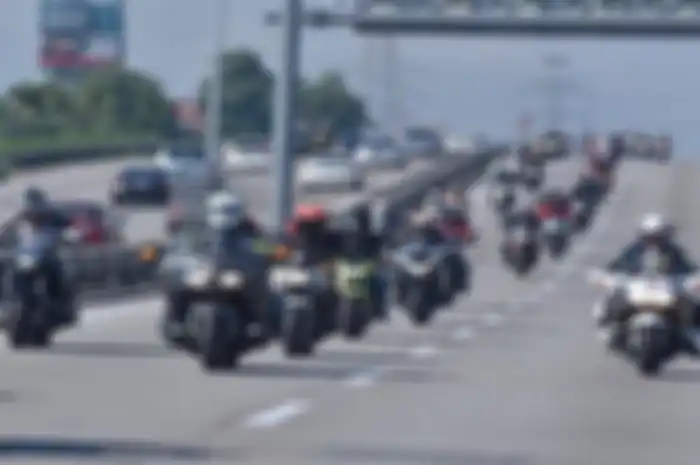 Ilustrasi motor masuk jalan tol.