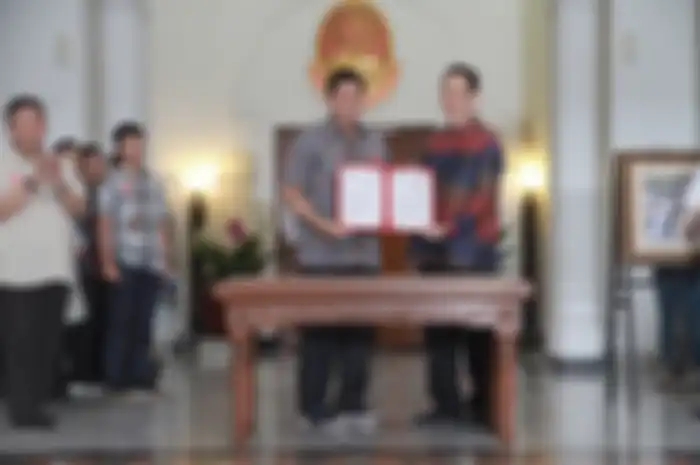 Penandatangan kerja sama antara PT DAM dan Pemerintah Kota Bandung mengenai UKM