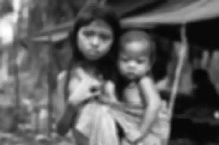 Foto dirilis Rabu (20/2/2019), menunjukkan anak Orang Rimba berada di tempat hunian sementara mereka di lahan perkebunan kelapa sawit warga, Bukit Suban, Air Hitam, Sarolangun, Jambi. Salah kelola hutan dan pemberian izin pengelolaan kawasan penyangga secara sembarang telah mengubah rupa orang-orang