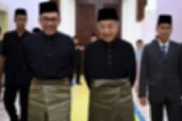 Anwar Ibrahim dan Mahathir