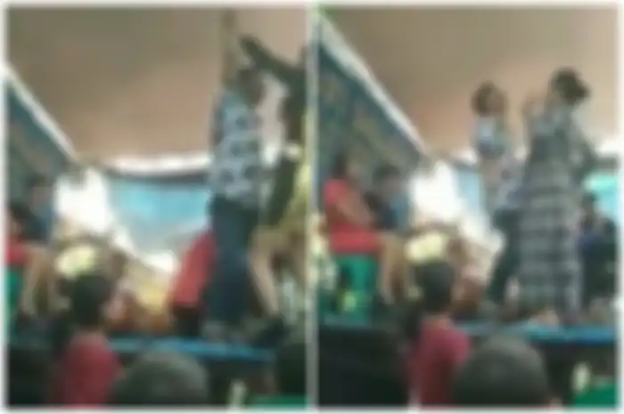 Kocak! Kepergok Asyik Joget dengan Biduan Dangdut, Pria Ini Langsung Disamperin sang Istri Sampai Naik ke Atas Panggung