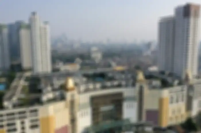Foto aerial suasana perumahan yang berada di atas mal Thamrin City, Jakarta, Rabu (26/6/2019). Keberadaan perumahan bernama Cosmo Park di atas pusat perbelanjaan Thamrin City ini menjadi bahan perbincangan warganet sejak Selasa kemarin setelah fotonya tersebar di media sosial, terdiri dari lima blok yaitu A1-A19, B1-B12, C1-C19, D1-D16, E1-E15, dan F1-F9.