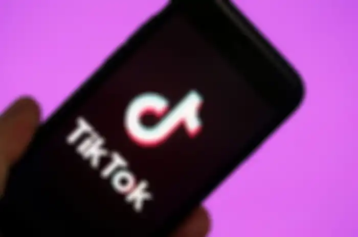 PARIS, FRANCE - MARCH 05: In this photo illustration, the social media application logo, Tik Tok is displayed on the screen of an iPhone on March 05, 2019 in Paris, France. The social network broke the rules for the protection of children's online privacy (COPPA) and was fined $ 5.7 million. The fact TikTok criticized is quite serious in the United States, the platform, which currently has more than 500 million users worldwide, collected data that should not have asked minors. TikTok, also known as Douyin in China, is a media app for creating and sharing short videos. Owned by ByteDance, Tik Tok is a leading video platform in Asia, United States, and other parts of the world. In 2018, the application gained popularity and became the most downloaded app in the U.S. in October 2018. (Photo by Chesnot/Getty Images)