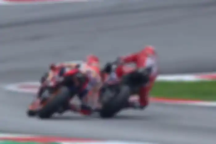 Manuver Andrea Dovizioso di tikungan terakhir MotoGP Austria membuat Marc Marquez hanya bisa finis ke-2.