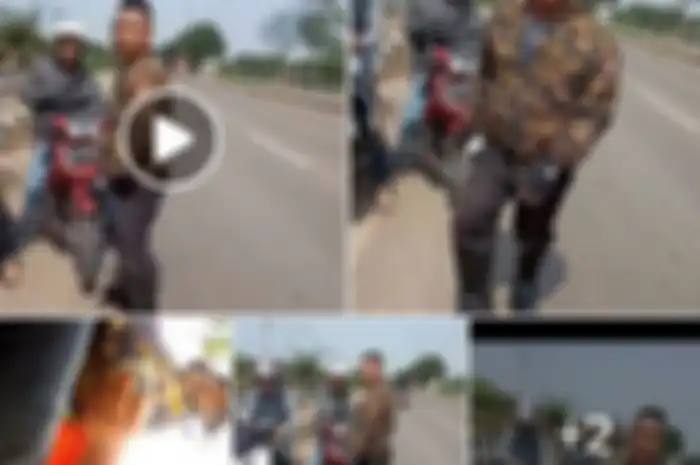 Polisi gadungan di daerah Karawang sedang menyetop pengendara motor