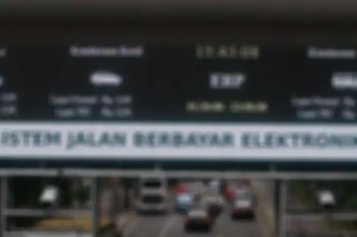 ILUSTRASI. Dishub DKI berharap jumlah pengendara motor di Jakarta berkurang dengan jalan berbayar.