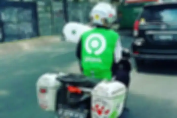 Eko Saiful Amin, driver ojol tanpa lengan kanan yang sangat inspiratif.