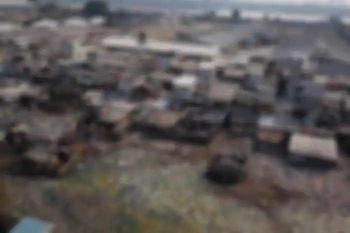 Lanskap Kampung Bengek yang menempati lahan milk PT Pelindo II di kawasan Muara Baru, Penjaringan, Jakarta Utara, yang dikelilingi sampah, Senin (2/9/2019).