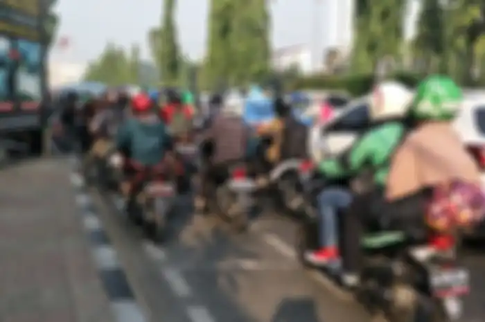 Ilustrasi motor melintas di jalan raya, wacana larangan motor melintas di jalan raya makin meluas.