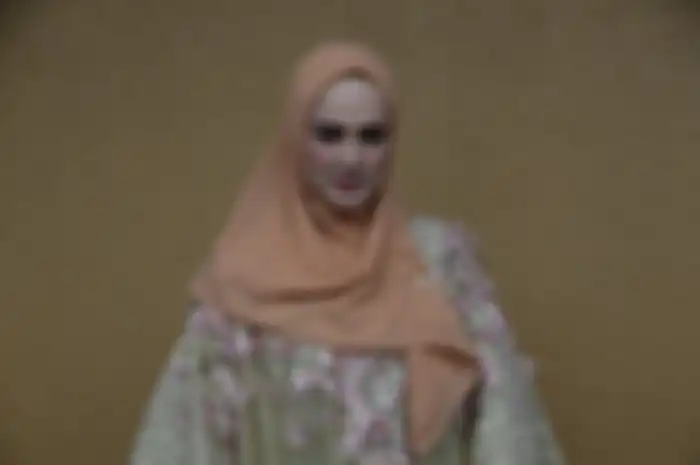 Mulan Jameela usai pelantikan anggota DPR, DPD, dan MPR periode 2019 - 2024 pada sidang paripurna di Kompleks Parlemen, Senayan, Jakarta, Selasa (1/9/2019) pagi.